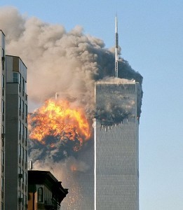 wtb-north_face_south_tower_after_plane_strike_9-11-credit-robert-source-wikipedia-commons-public-domain-261x300